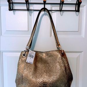 Gold Michael Kors purse